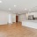a large kitchen with white cabinets