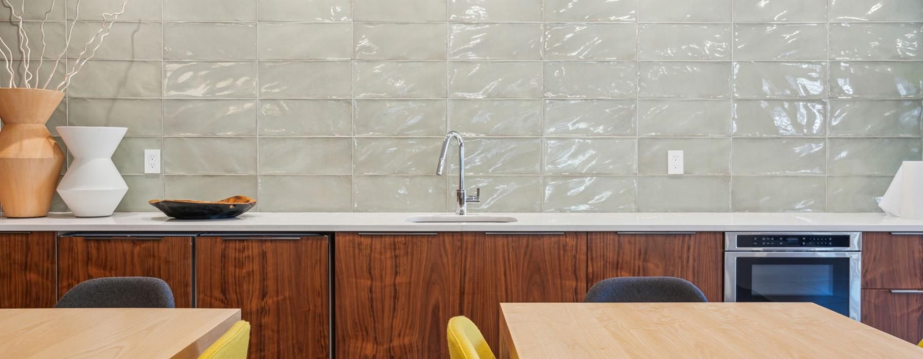 a kitchen with a table and chairs