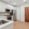 a kitchen with white cabinets