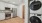 a kitchen with white cabinets